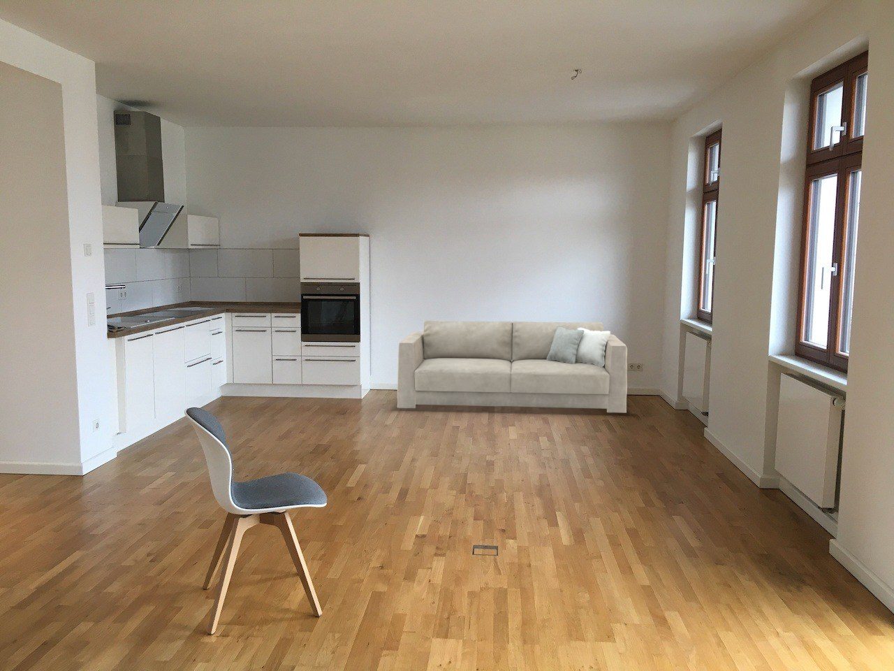 86 in sofa in an open-plan kitchen and living room